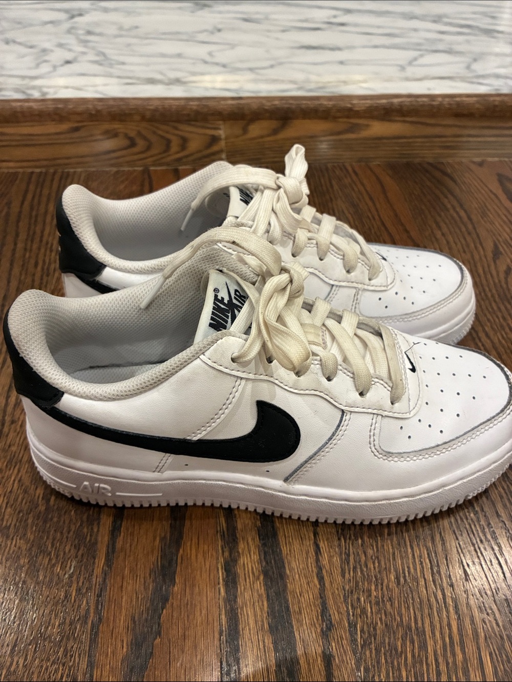 Nike Air Force One: Nike Kids White and Black Low-Top Sneakers with Black Swoosh
